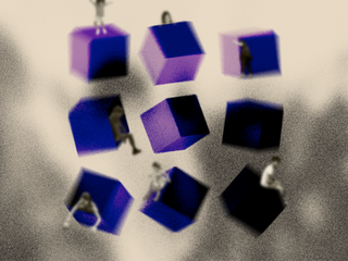 Several purple cubes of different rotations with people standing on them and in them.